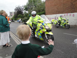 Olympic Torch Relay Policeman Hi Five Boy